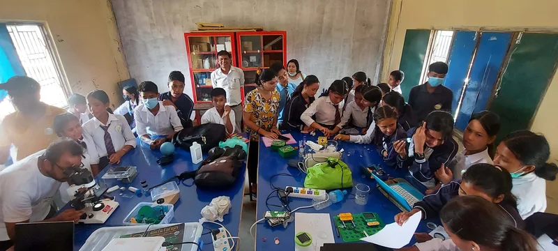 School children engaged in science outreach